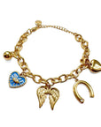 Gold bracelet with heart, angel wing, and horseshoe charms on a white background