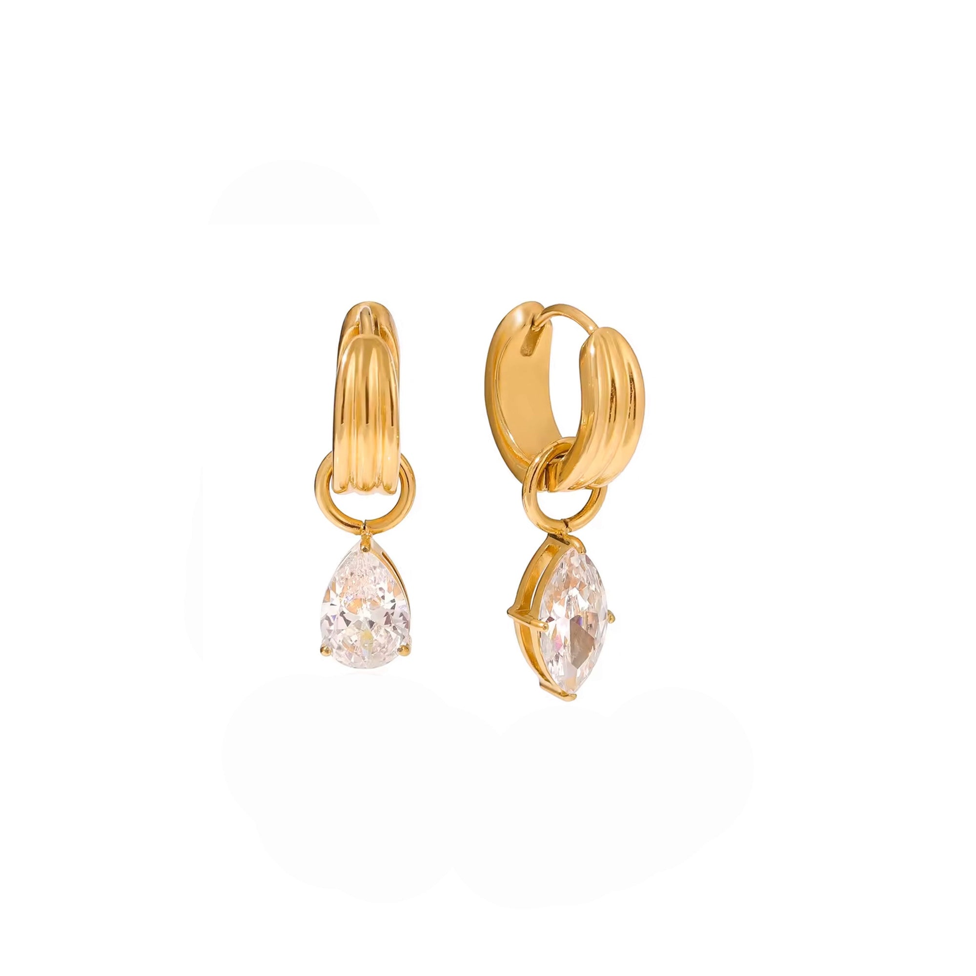 Gold hoop earrings with teardrop-shaped clear stones on a white background