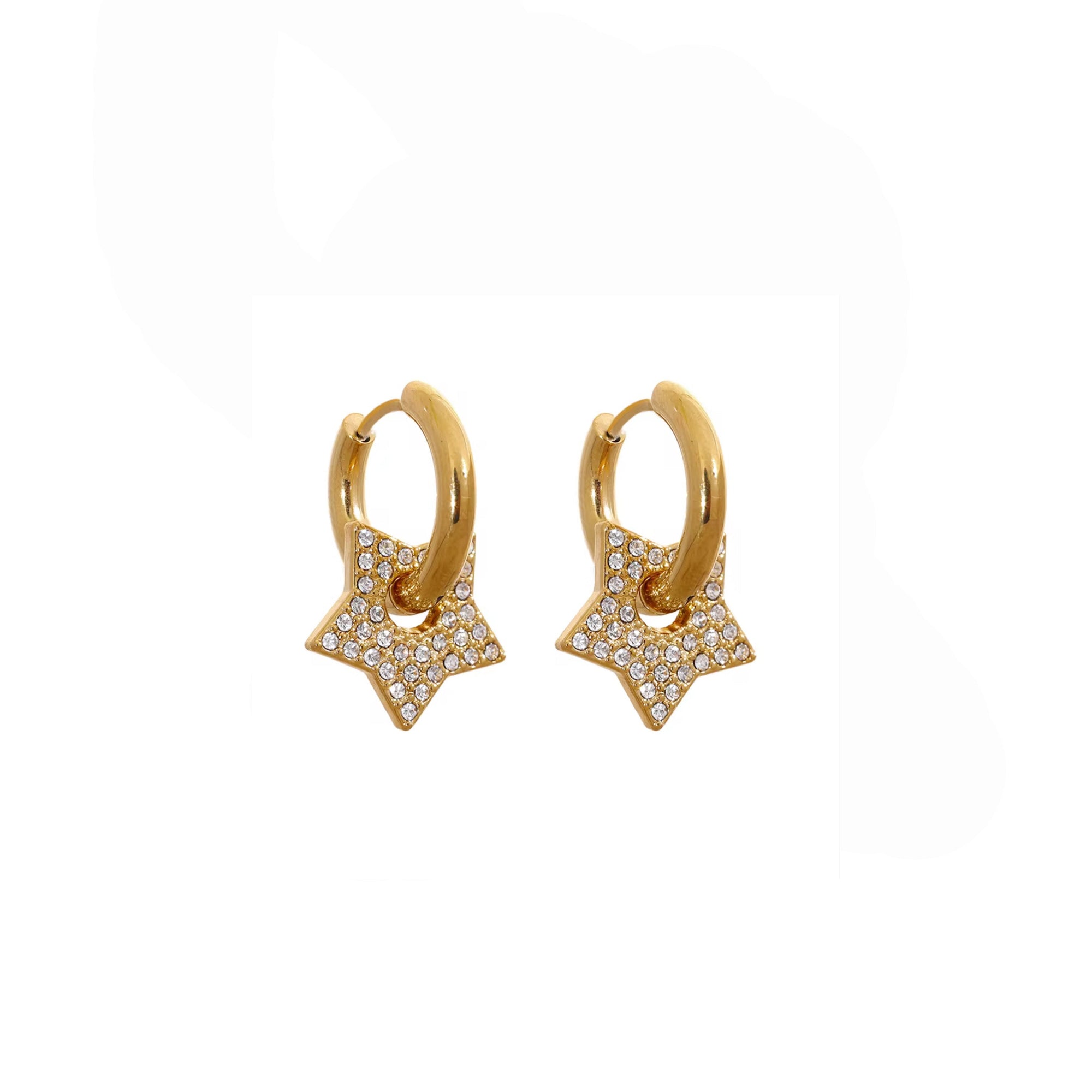 Gold hoop earrings with star-shaped charms on a white background