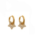 Gold hoop earrings with star-shaped charms on a white background